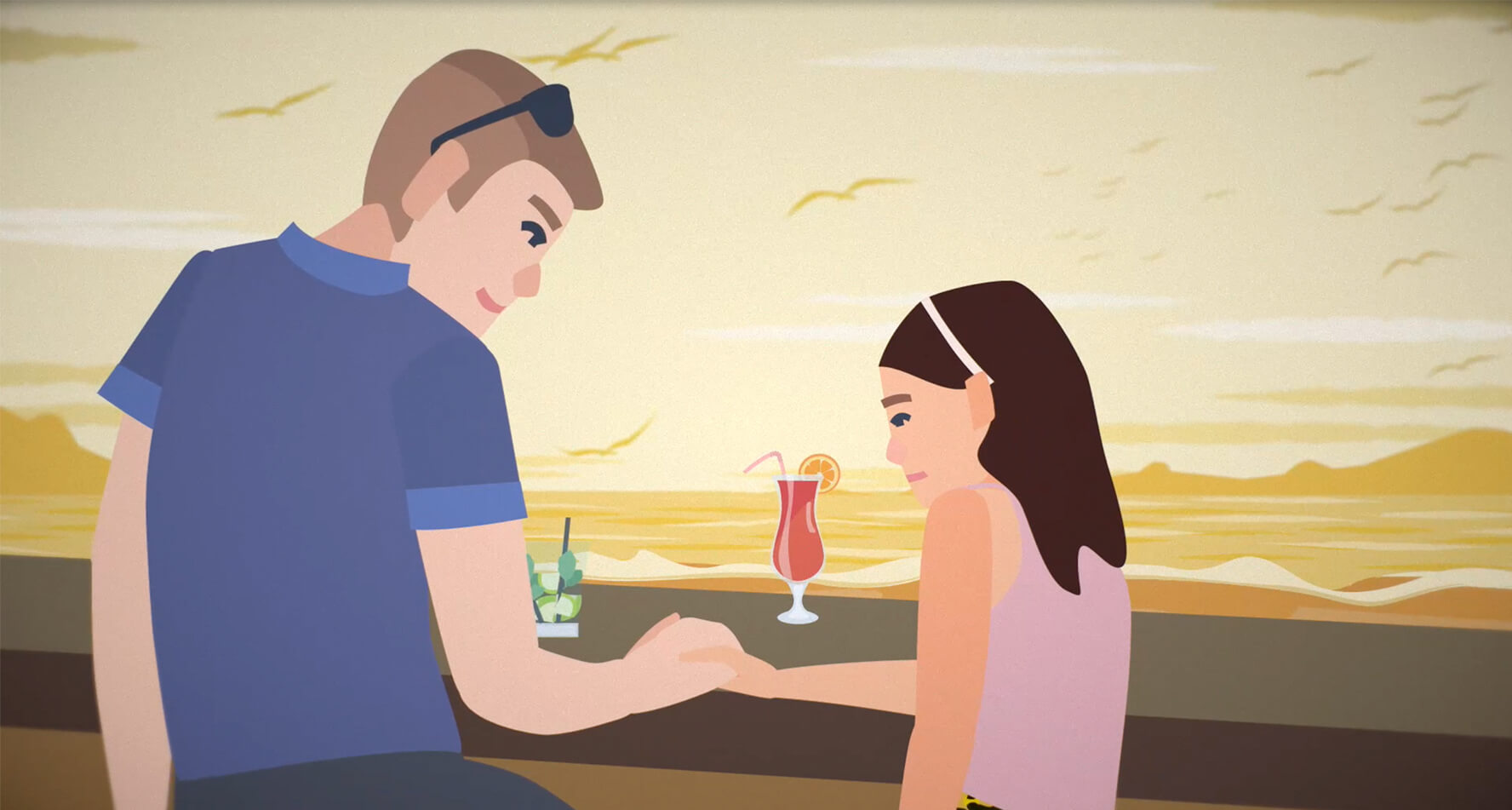 Ein Mann und ein Mädchen trinken an einer Bar einen Cocktail. Der Mann hält die Hand des Mädchens